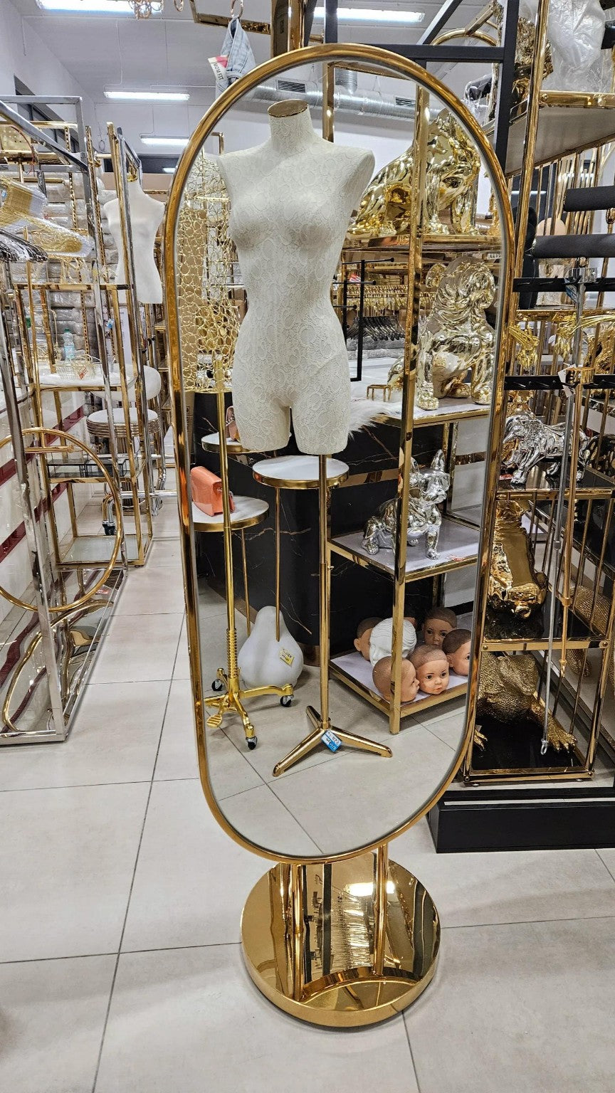 Espejo ovalado dorado de doble cara