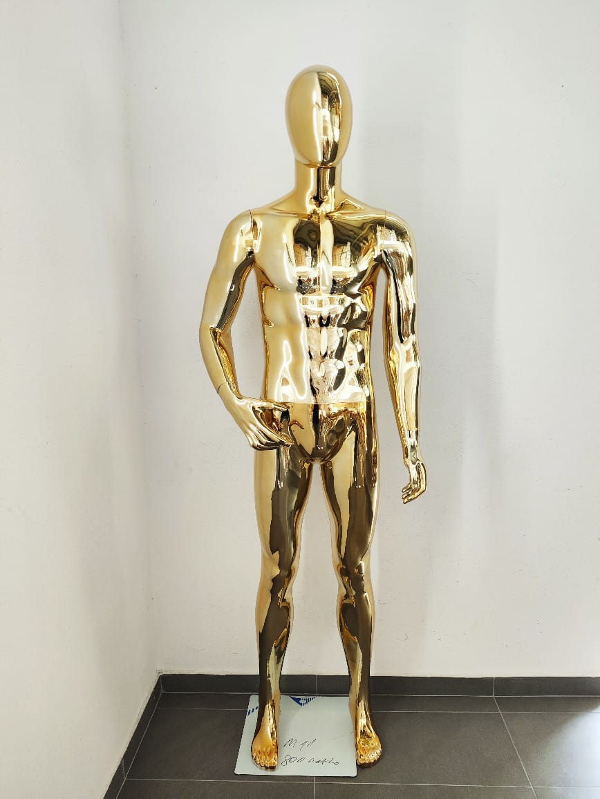 Maniquí masculino dorado